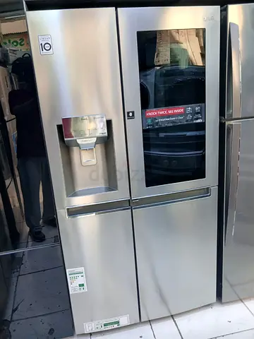 Lg side by side instavew nock door in door with water dispenser ice maker fridge for sale