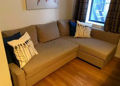 Beige L-shaped Corner Sofa bed with Chaise - Good Condition