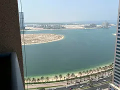 Luxury 1BHK in Al Khan with premium finishing, sea-view balcony, built-in wardrobes, spacious layout