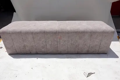 (34) Modern upholstered bench with a sleek