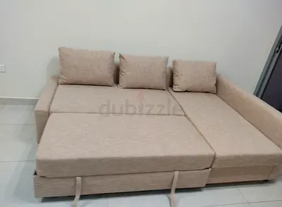 Ikea L Shape Sofa cum bed with big storage in L