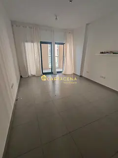 Studio with balcony and appliances