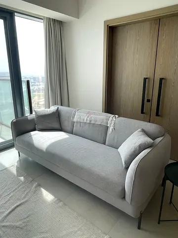 Light grey 3-seater sofa, modern design — lightly used. UK owned