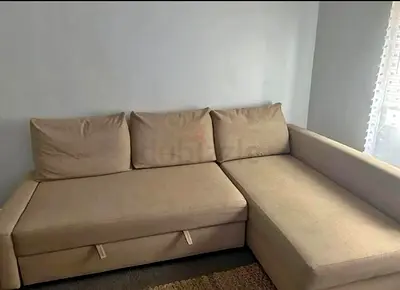 Beige L-shaped Sofa with Storage — Good Condition