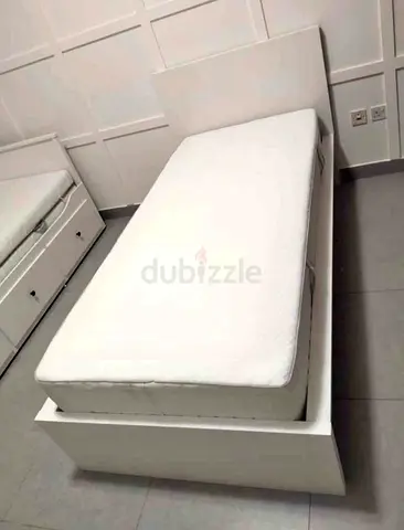 Malam single  bed 90/200cm bed and Ikea mattress is available in excellent condition, not a single