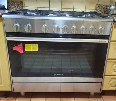 Bosch 5-burner Stainless Steel Freestanding Gas Cooker with Oven - Good Condition