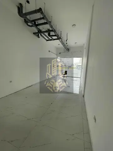 Shop for rent in Al Alia, Ajman. 420 sq.ft, brand new building, prime location in a high-end area, great business opportunity. AED 35,000 in 4 cheques