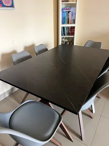 Modern 6-seater dining table with 6 grey chairs (used)