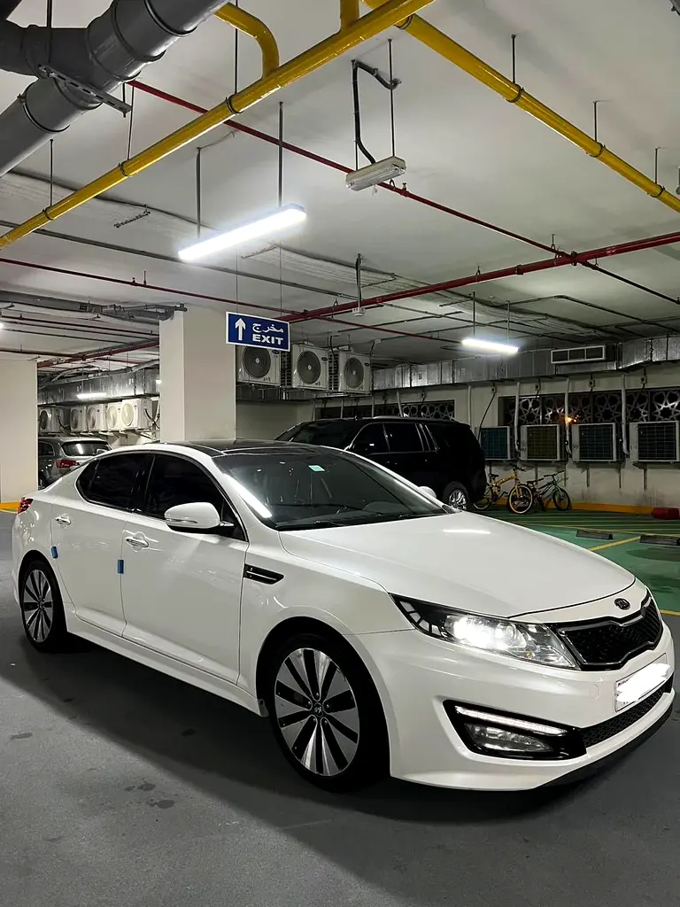 Kia K5 2012 — photo 1 of 7