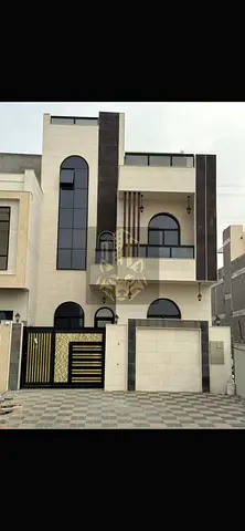 Luxury villa for sale, including registration and ownership fees, in the prestigious Al Helio 2 area of ​​Ajman.