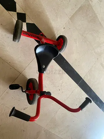 Red toddler tricycle – metal frame, used, working condition