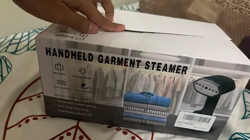 Handheld garment steamer