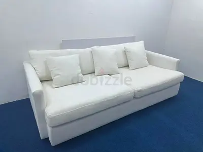 Still brand new cratebarrel three seater sofa