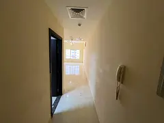 One bedroom and living room with parking in Emirates City - excellent size - prime location