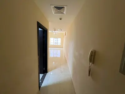 One bedroom and living room with parking in Emirates City - excellent size - prime location