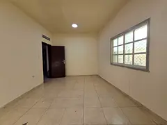 2-bedroom apartment in Al Nuaimiya Ajman, ground floor, separate living room, central AC, prime loca