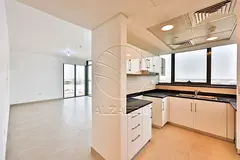 VACANT- Corner Unit - Partial Sea View