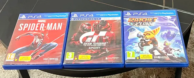 PS4 Game Collection: Marvel Spider-Man , Gran Turismo Sport used lightly, Ratchet  Clank used once