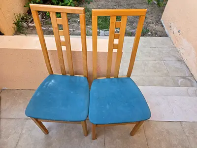 Set of 2 wooden dining chairs with blue upholstered seats