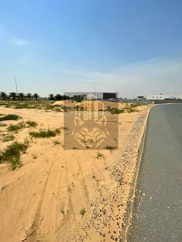 Residential & commercial land for sale in Ajman – Al Alia, 18,575 sq.ft, G+15 permit, freehold for all nationalities, prime investment location, AE