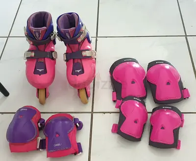 Girls pink  purple inline skates with protection pads - size 25-29