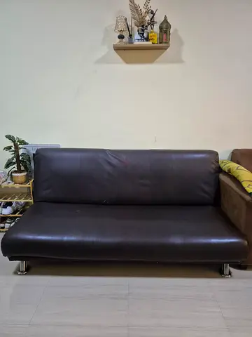 Brown leather 2-seater sofa in good condition