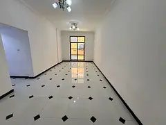 Two bedrooms and a living room - Al Rawda 3, Ajman - Central air conditioning - Free maintenance - F