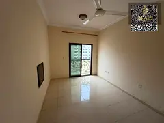 For Rent in Al Hamidiya, Ajman – Spacious 1BHK with central AC, 2 balconies, prime location behind