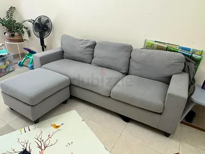 Grey 3-seater sectional sofa with ottoman - good condition