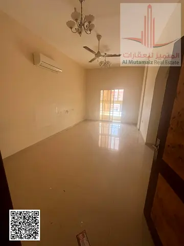 Two bedrooms and a living room for annual rent in Ajman, in Ahmed Tawfiq building, Al Rawda 1. Aski