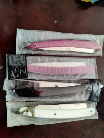 Set of 4 folding straight razors (barber style) - new in sleeves
