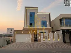 Luxury villa for sale in Al Bahia area, featuring two floors and a rooftop, a modern swimming pool,