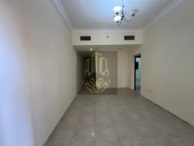 For Sale | 2BR Apartment in Al Amerah | Balcony & Central AC | Parking | On Sheikh Mohammed Bin Zayed Rd