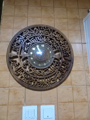 Hand-carved Round Wooden Wall Clock with Arabic Calligraphy