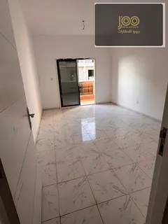 One bedroom and living room for rent in Al Rawda 2 area, Ajman, on the main street.