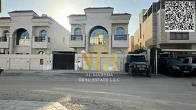 Two-story villa with all registration fees included, in one of Ajman's most prestigious areas. F