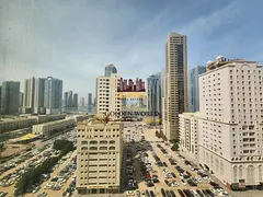 2BR in Al Majaz 3, free AC, spacious, open view, master room, 3 baths, panoramic windows, gym &amp; 