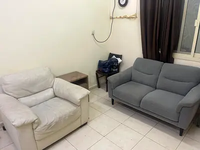 Two-Seat Grey Sofa and Single White Armchair - Good Condition