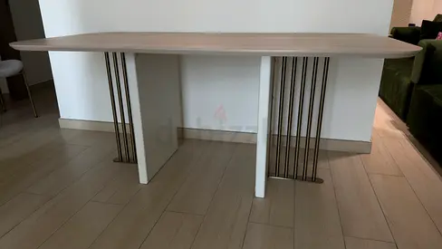 Oval wooden dining table with 4 chairs