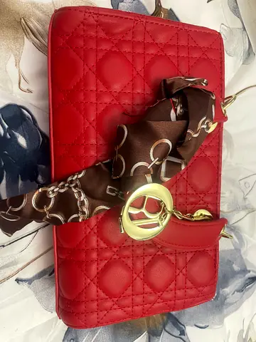 Red Quilted Shoulder Bag with Gold Hardware and Scarf Detail