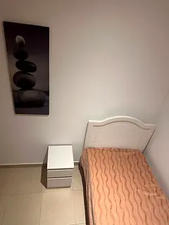 furnished room in a clean apartment with only  four tenants staying NON SMOKING available in JVC