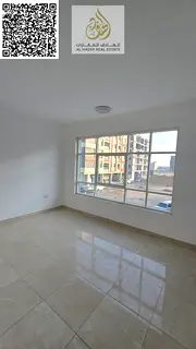 One-bedroom apartment with a living room, two bathrooms, and a balcony. Second tenant in Ajman. For