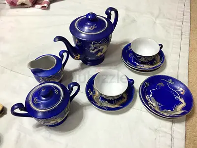 Blue porcelain dragon tea set – teapot, sugar, creamer, cups  saucers