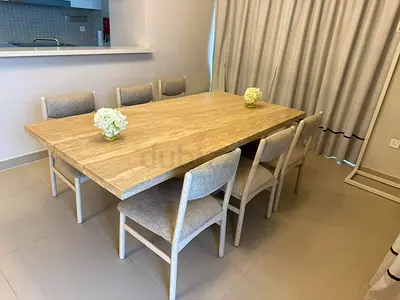 Available high quality pure mabrel dining table with six chairs like a new