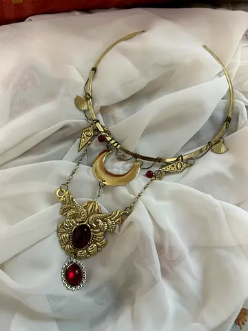 Vintage-style gold-tone headpiece with red stones (crescent moon pendant)
