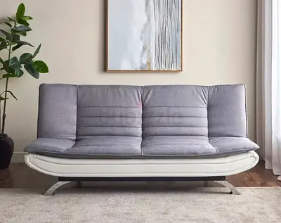My grey convertible futon sofa bed — good condition, reclines to a bed