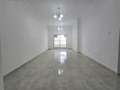 Two bedrooms and a living room - Emirates City - Central air conditioning - Free maintenance - Famil