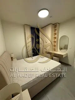 Furnished one-bedroom apartment for annual rent in Aljada, featuring high-end finishes and a prime l