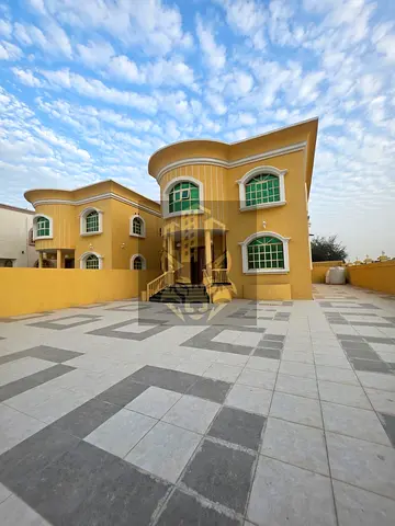 Luxury villa for sale in Al Muwaihat 2, including electricity, water and AC