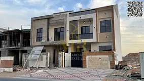 Two-story villa with all registration and ownership fees included, in one of Ajman's most presti
